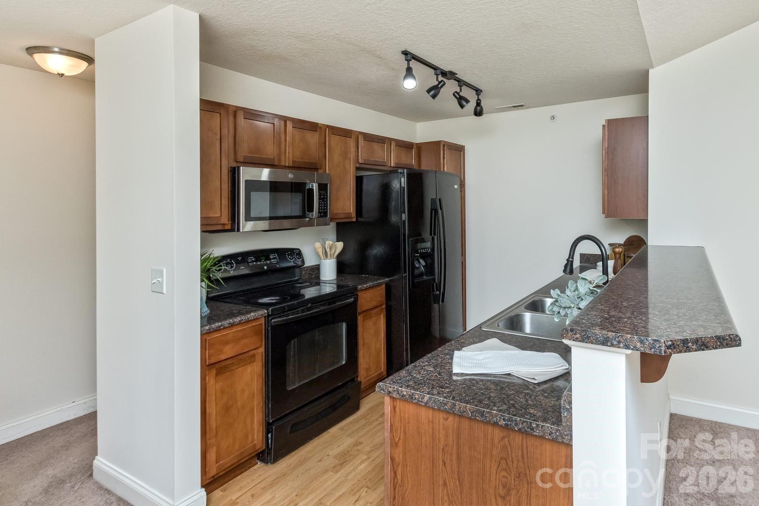 123 Foxden Drive #204 — Fletcher
